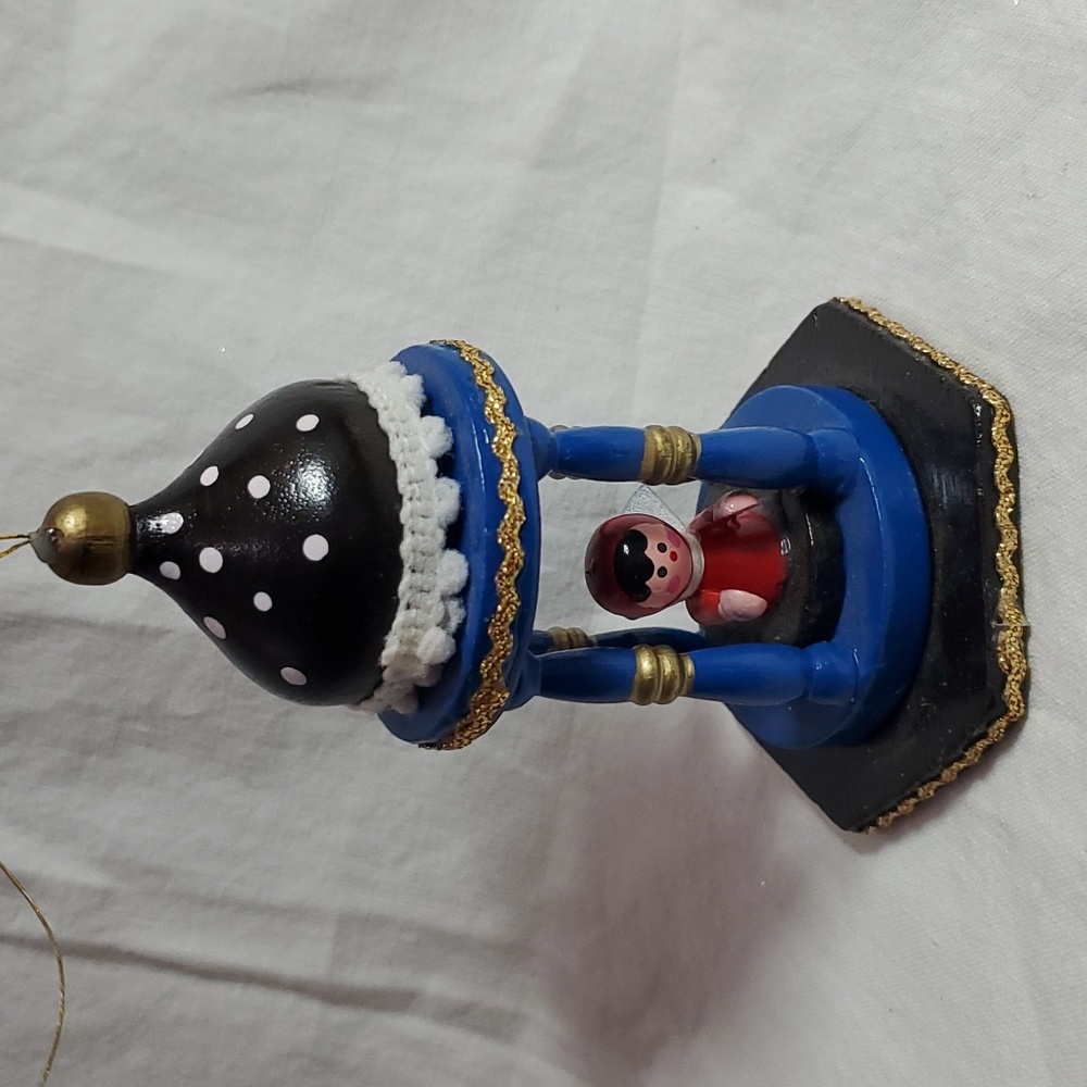 Angel in wood gazebo ornament. Hand painted